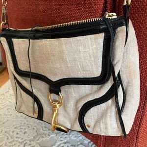 Chic Beige Crossbody Bag with Black Trim